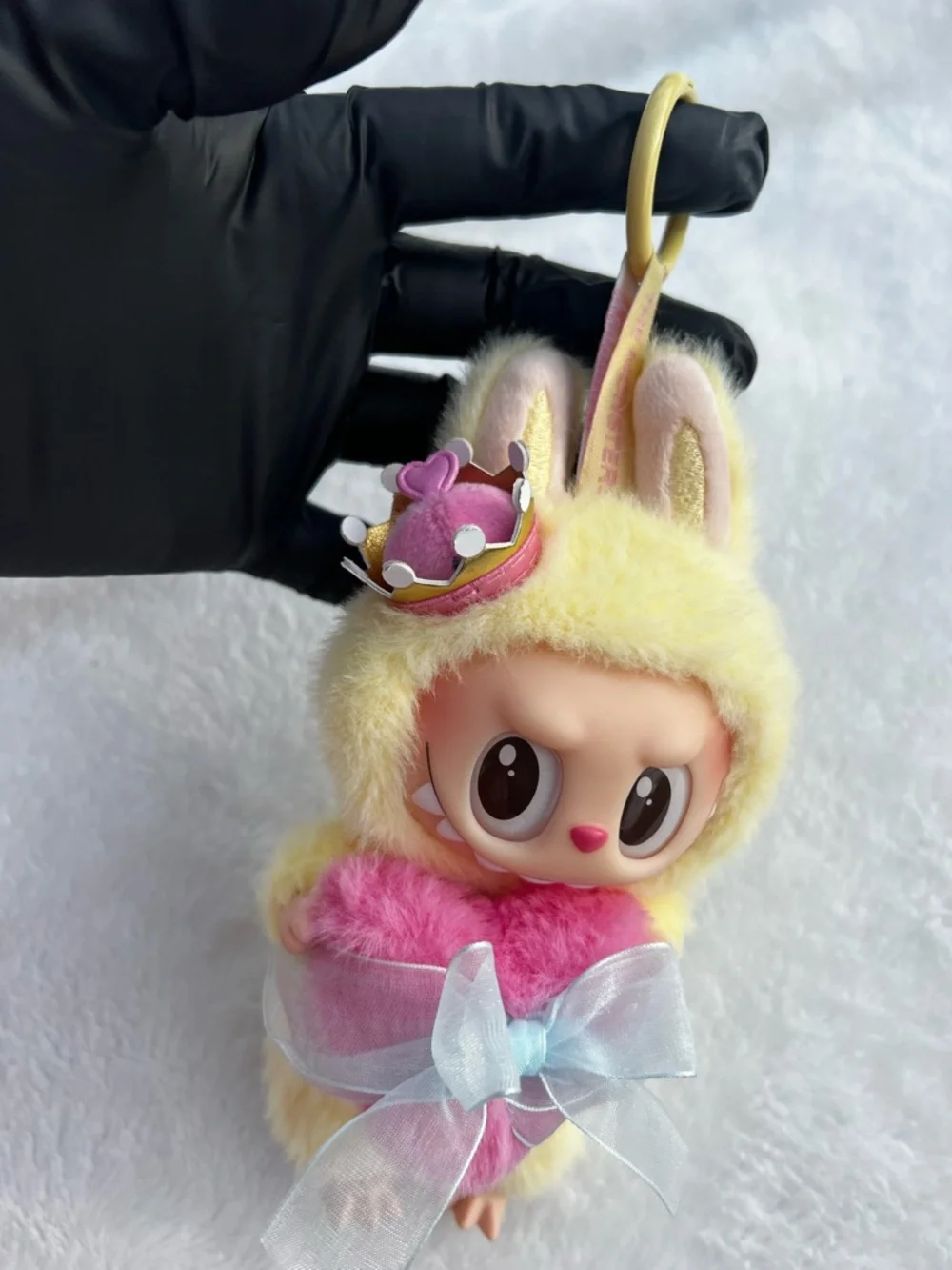 Pop Mart Labubu in Yellow and Pink with Blue Bow and Crown, and ring attached